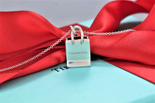 Load image into Gallery viewer, Tiffany &amp; Co. Silver Tiffany Shopping Bag Charm Pendant Necklace
