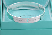 Load image into Gallery viewer, Tiffany &amp; Co. Silver Locks 2 Diamond Keyhole Bangle Bracelet
