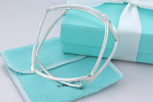 Load image into Gallery viewer, Tiffany &amp; Co. Frank Gehry Silver Open Torque Square Bangle Bracelet
