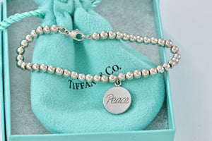Tiffany & co. Paloma Picasso Silver Grafitti "PEACE" Circle Disc Bead Bracelet