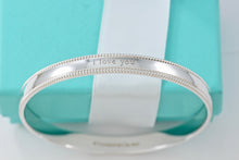 Load image into Gallery viewer, Tiffany &amp; Co. Silver Yours &quot;I Love You&quot; Beaded Edge Bangle
