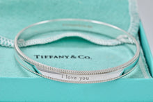 Load image into Gallery viewer, Tiffany &amp; Co. Silver Yours &quot;I Love You&quot; Beaded Edge Bangle
