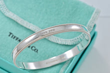 Load image into Gallery viewer, Tiffany &amp; Co. Silver Yours &quot;I Love You&quot; Beaded Edge Bangle
