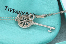 Load image into Gallery viewer, Tiffany &amp; Co. Silver Daisy Flower Diamond Key Necklace
