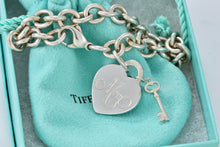 Load image into Gallery viewer, Tiffany &amp; Co. Silver &quot;MOM&quot; inscribed Heart &amp; Mini Key Charm Bracelet

