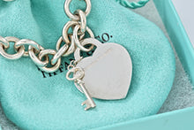 Load image into Gallery viewer, Tiffany &amp; Co. Silver &quot;MOM&quot; inscribed Heart &amp; Mini Key Charm Bracelet
