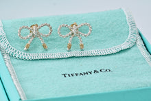 Load image into Gallery viewer, Tiffany &amp; Co. 18K Gold &amp; Silver Twist Rope Coil Ribbon Bow Earrings Vintage
