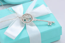 Load image into Gallery viewer, Tiffany &amp; Co. Silver Large Daisy Blossom Flower Key on Oval Link Chain Necklace
