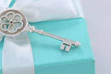Load image into Gallery viewer, Tiffany &amp; Co. Silver Large Daisy Blossom Flower Key on Oval Link Chain Necklace
