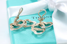 Load image into Gallery viewer, Tiffany &amp; Co. Silver Triple interlocking Heart Clip-On Earrings
