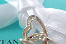 Load image into Gallery viewer, Tiffany &amp; Co. Silver Triple interlocking Heart Clip-On Earrings
