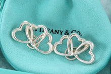 Load image into Gallery viewer, Tiffany &amp; Co. Silver Triple interlocking Heart Clip-On Earrings
