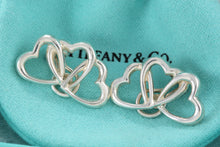 Load image into Gallery viewer, Tiffany &amp; Co. Silver Triple interlocking Heart Clip-On Earrings
