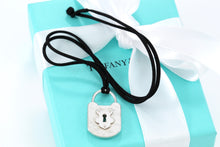 Load image into Gallery viewer, Tiffany &amp; Co. Large Hammered Keyhole Padlock Pendant Silk Cord Necklace
