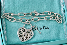 Load image into Gallery viewer, Tiffany &amp; Co. Silver Keyhole Heart Filigree &amp; Mini Key Pendant Oval Link 7.5&quot; Bracelet
