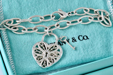 Load image into Gallery viewer, Tiffany &amp; Co. Silver Keyhole Heart Filigree &amp; Mini Key Pendant Oval Link 7.5&quot; Bracelet
