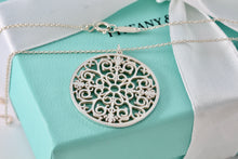 Load image into Gallery viewer, Tiffany &amp; Co. Silver Large Circle Enchant Round Medallion Necklace
