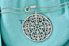 Load image into Gallery viewer, Tiffany &amp; Co. Silver Large Circle Enchant Round Medallion Necklace
