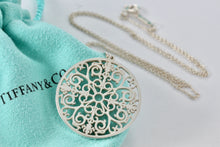Load image into Gallery viewer, Tiffany &amp; Co. Silver Large Circle Enchant Round Medallion Necklace
