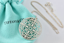 Load image into Gallery viewer, Tiffany &amp; Co. Silver Large Circle Enchant Round Medallion Necklace
