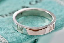 Load image into Gallery viewer, Tiffany &amp; Co. Atlas Silver Motif Narrow Band Ring
