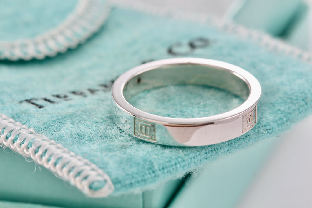 Tiffany & Co. Atlas Silver Motif Narrow Band Ring