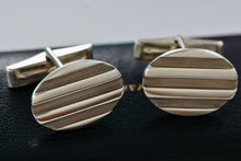 Load image into Gallery viewer, Tiffany &amp; Co. Atlas Silver Groove Oval Cufflinks
