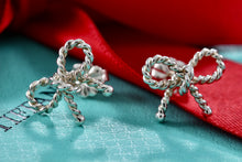 Load image into Gallery viewer, Tiffany &amp; Co. Silver Small Twist Bow Ribbon Stud Earrings
