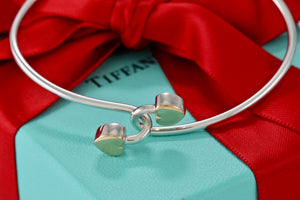 Tiffany 18K Gold & Silver Interlocking Hearts Bangle Bracelet