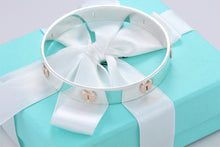 Load image into Gallery viewer, Tiffany &amp; Co. 18K Gold &amp; Silver Keyhole Locks Heart Bangle Bracelet
