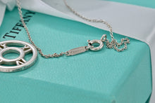 Load image into Gallery viewer, Tiffany &amp; Co. Atlas Small Circle Roman Numerals Medallion Necklace
