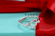 Load image into Gallery viewer, Tiffany &amp; Co. Elsa Peretti Silver Mini Open Heart Ring

