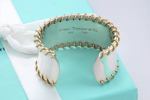 Load image into Gallery viewer, Tiffany &amp; Co. 18Kt. Gold &amp; Silver Spiral Cuff Bracelet
