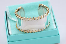 Load image into Gallery viewer, Tiffany &amp; Co. 18Kt. Gold &amp; Silver Spiral Cuff Bracelet
