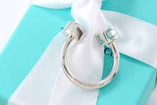 Load image into Gallery viewer, Tiffany &amp; Co. Silver Blue Enamel Square Block Horseshoe Keyring
