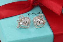 Load image into Gallery viewer, Tiffany &amp; Co. Silver Mini Keyhole Heart Dangling Key Stud Earrings
