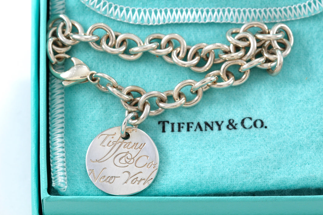 Tiffany & Co. Silver Notes Small Wavy Round Tag Bracelet