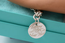 Load image into Gallery viewer, Tiffany &amp; Co. Silver Notes Small Wavy Round Tag Bracelet
