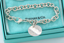 Load image into Gallery viewer, Tiffany &amp; Co. Silver Notes Small Wavy Round Tag Bracelet
