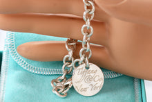 Load image into Gallery viewer, Tiffany &amp; Co. Silver Notes Small Wavy Round Tag Bracelet
