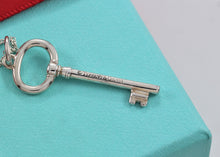 Load image into Gallery viewer, Tiffany &amp; Co. Silver Small Oval Key 1.25&quot; Pendant
