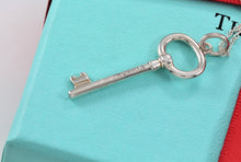Load image into Gallery viewer, Tiffany &amp; Co. Silver Small Oval Key 1.25&quot; Pendant
