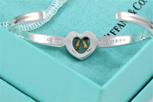 Load image into Gallery viewer, Tiffany &amp; Co. 18K Gold &amp; Silver Ribbon Bow Heart Cuff Bracelet
