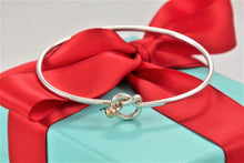 Load image into Gallery viewer, Tiffany &amp; Co. 18K Gold &amp; Silver Love Knot Hook Bangle Bracelet
