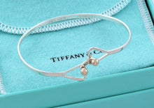 Load image into Gallery viewer, Tiffany &amp; Co. 14K Gold Trim &amp; Silver Double Heart Hook Bangle Bracelet

